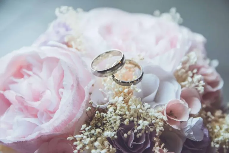 Wedding rings on flowers